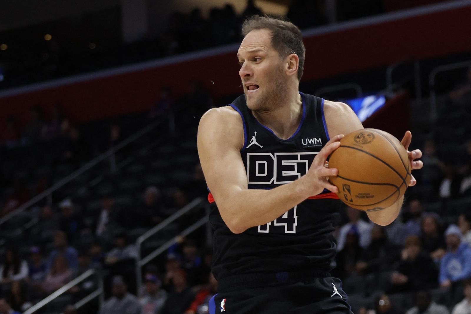 Jan 17, 2024; Detroit, Michigan, USA;  Detroit Pistons forward Bojan Bogdanovic (44) grabs the rebound in the first half against the Minnesota Timberwolves at Little Caesars Arena. Mandatory Credit: Rick Osentoski-USA TODAY Sports Photo: Rick Osentoski/REUTERS