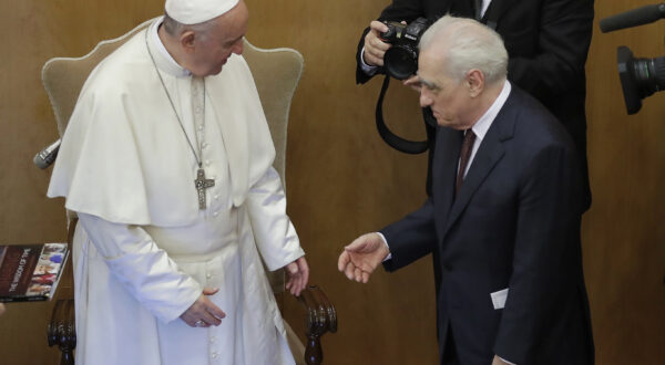 Film director Martin Scorsese greets Pope Francis at the end of the book presentation "The Wisdom of Time", a collection of 250 interviews from over 30 countries, with various stories of old and young people commented by Pope Francis. (AP Photo/Alessandra Tarantino)