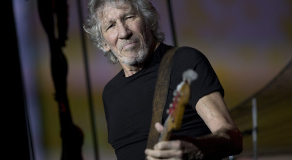 British singer and songwriter Roger Waters performs during his concert of the Us+Them tour at Maracana stadium, Rio de Janeiro, Brazil, Wednesday, Oct. 24, 2018. (AP Photo/Silvia Izquierdo)