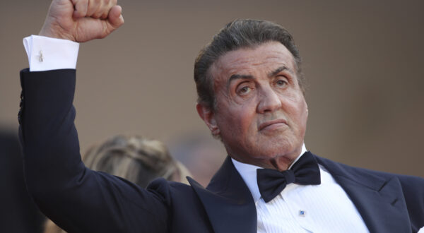 Actor Sylvester Stallone poses for photographers upon arrival at the awards ceremony of the 72nd international film festival, Cannes, southern France, Saturday, May 25, 2019. (AP Photo/Petros Giannakouris)