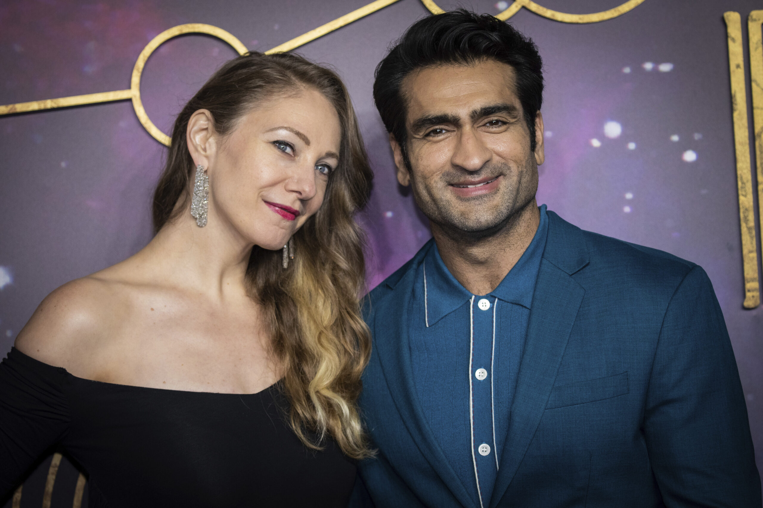 Emily V. Gordon, left, and Kumail Nanjiani pose for photographers upon arrival at the premiere of the film 'Eternals' on Wednesday, Oct. 27, 2021 in London. (Photo by Vianney Le Caer/Invision/AP)