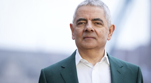 Rowan Atkinson poses for photographers upon arrival at the photo call of the film 'Wonka' in London, Monday, Nov. 27, 2023. (Photo by Scott Garfitt/Invision/AP)