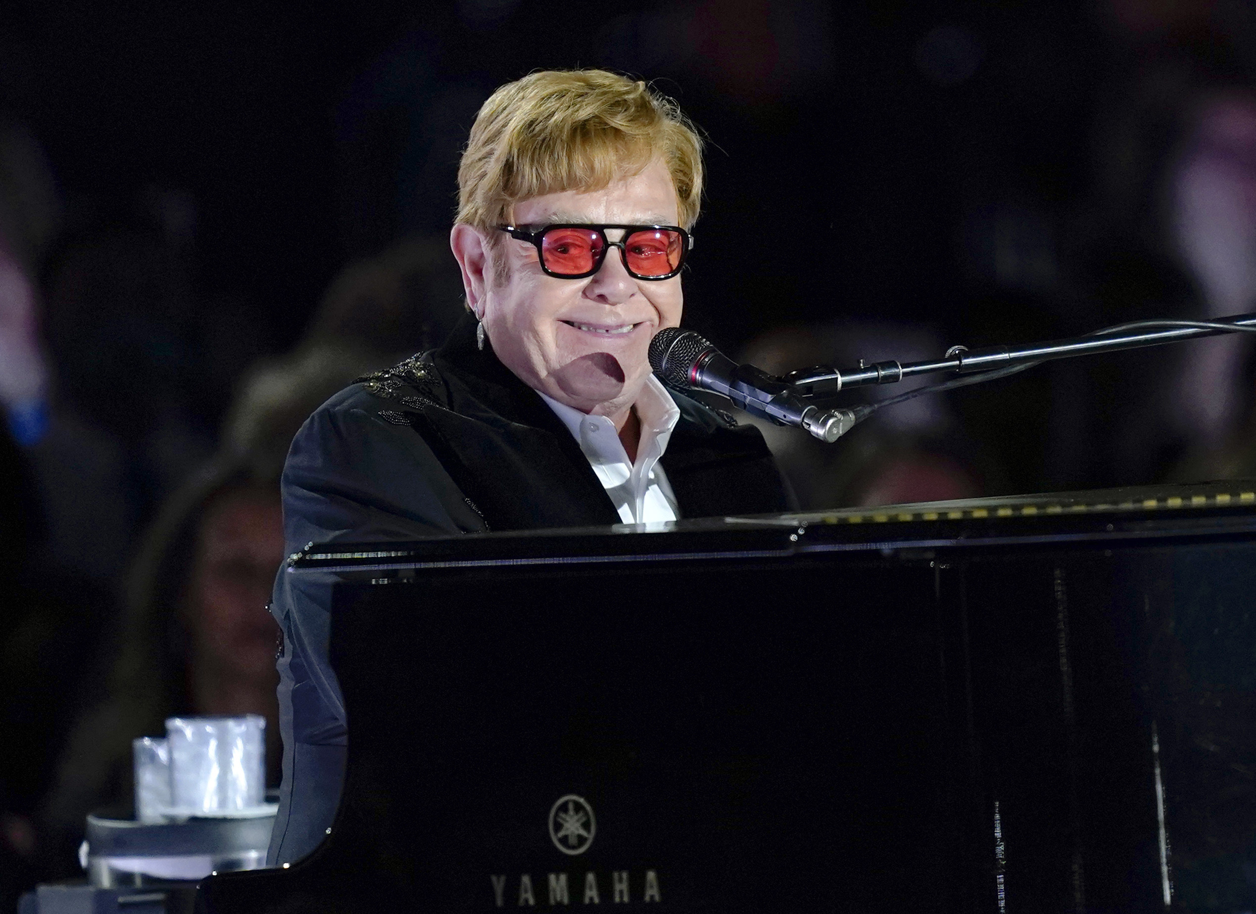 FILE - Elton John performs on the South Lawn of the White House in Washington on Sept. 23, 2022. John has achieved EGOT status. The famed British singer-pianist secured an Emmy Award on Monday night, Jan. 15, 2024, for best variety special (live) for “Elton John Live: Farewell from Dodger Stadium,” a three-hour concert documentary that streamed on Disney +.  (AP Photo/Susan Walsh, File)