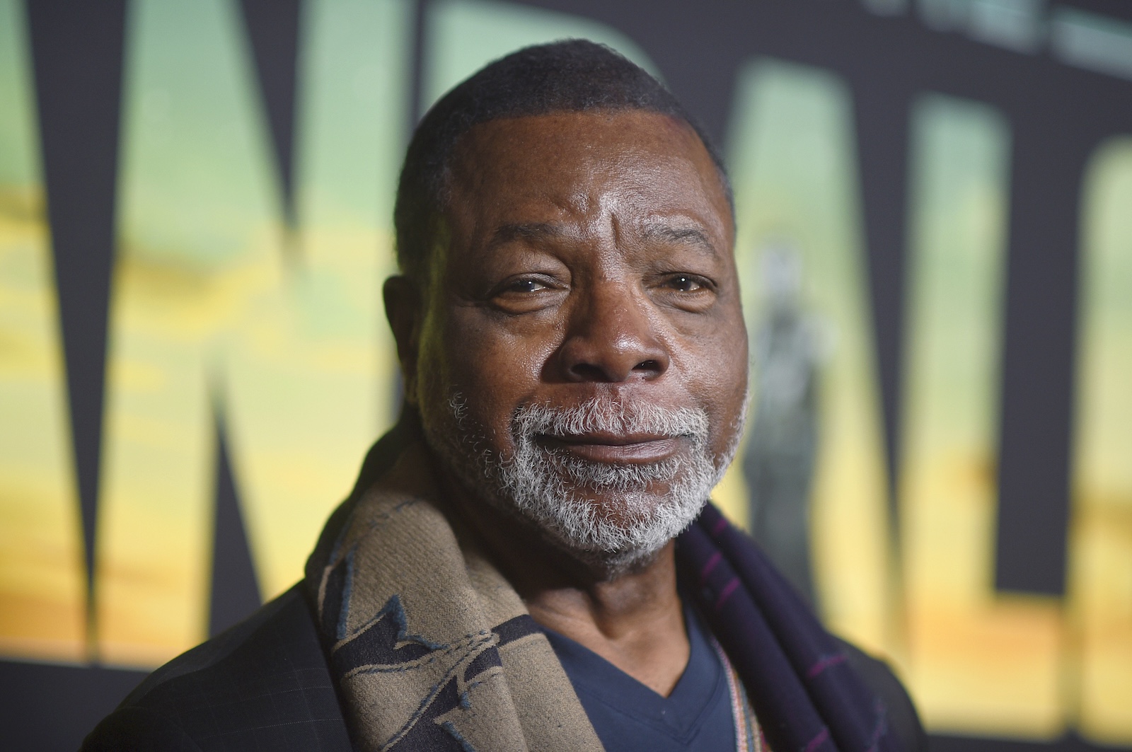 FILE - Carl Weathers arrives at a special screening for the season three premiere of "The Mandalorian" on Tuesday, Feb. 28, 2023, at The Roosevelt Hotel in Los Angeles. Weathers, a former NFL linebacker who became a Hollywood action movie and comedy star, playing nemesis-turned-ally Apollo Creed in the “Rocky” movies, facing-off against Arnold Schwarzenegger in “Predator” and teaching golf in “Happy Gilmore,” died Tuesday, Jan. 30, 2024. He was 76.  (Photo by Richard Shotwell/Invision/AP, File)