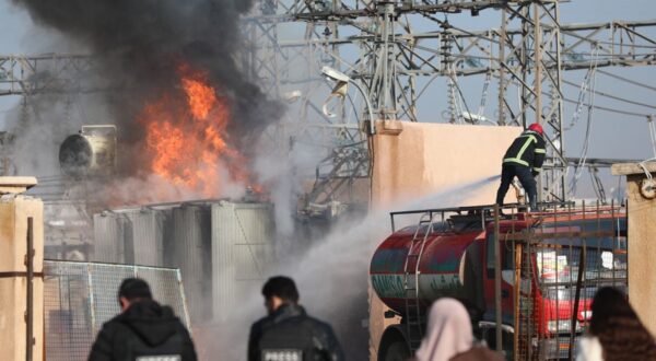 epa11079611 Firefighters try to extinguish flames at a power station in Qamishli town, northeast Syria, 15 January 2024. Syrian state-media said Turkish drone targeted locations in northern Syria, adding that transformer stations in Qamishli went out of service. Turkey on 14 January announced targeting Kurdish sites in northern Iraq and Syria they suspect to have links to the Kurdistan Workers Party (PKK), after the death of nine Turkish soldiers in an attack in northern Iraq.  EPA/AHMED MARDNLI