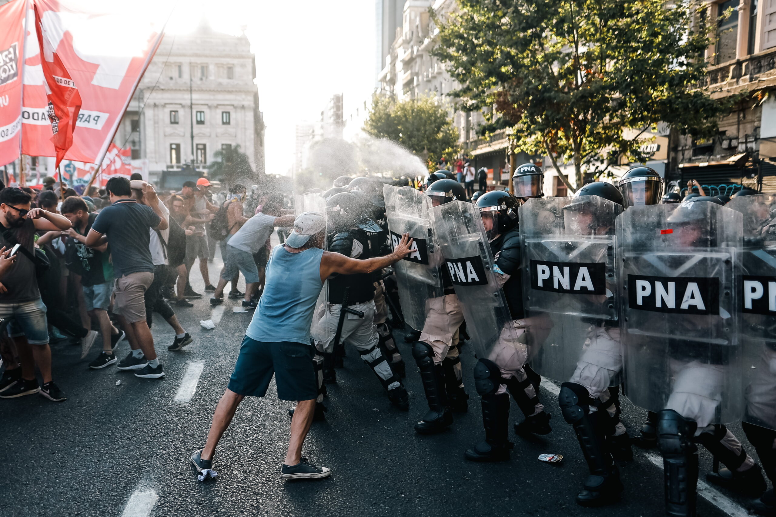 epa11116921 Demonstrators clash with police during a protest against the 'omnibus law' bill outside Congress in Buenos Aires, Argentina, 31 January 2024. The Argentine Congress began the debate on the Law of Bases and Starting Points for the Freedom of Argentines, known as the 'omnibus law', the star project of Argentinian President Javier Milei, with which he seeks to implement a series of profound economic reforms in the country.  EPA/JUAN IGNACIO RONCORONI