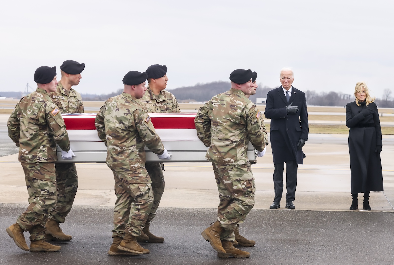 epa11121592 US President Joe Biden (2-R)  and First Lady Dr. Jill Biden (R) watch as a US Army carry team moves a flag-draped transfer case containing the remains of US Army Sergeant Breonna Moffett, during a dignified transfer of fallen US service members at Dover Air Force Base in Dover, Delaware, USA, 02 February 2024. US Army Sergeant Jerome Rivers. US Army Sergeant Breonna Moffett, and US Army Sergeant Kennedy Sanders died in a drone strike on 28 January at a military base in Jordan; forty other US troops were also injured in the attack. The enemy drone, which the White House has blamed on an Iran-backed militia, may have been mistaken for a US drone and left unimpeded, according to a preliminary report.  EPA/MICHAEL REYNOLDS