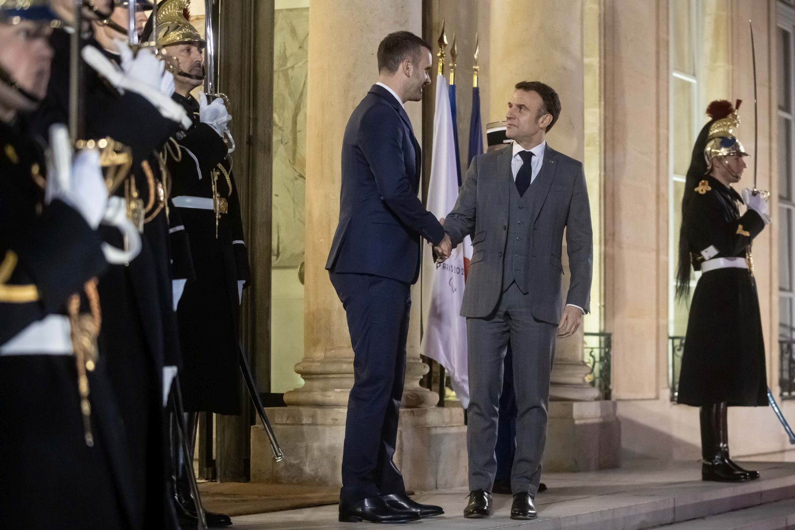 epa11129647 French President Emmanuel Macron (R) welcomes Montenegro's Prime Minister Milojko Spajic (L) at the Elysee Palace in Paris, France, 05 January 2024.  EPA/CHRISTOPHE PETIT TESSON
