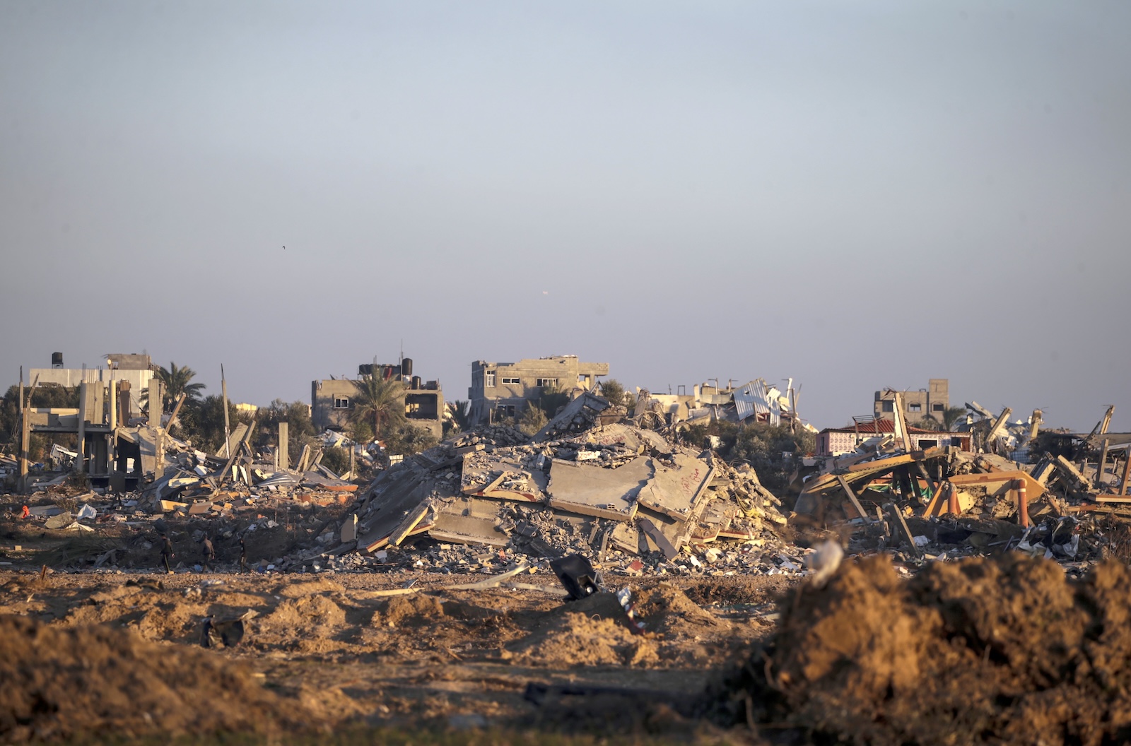 epa11134679 Destroyed houses in Al Bureij refugee camp, Gaza Strip, 07 February 2024, following Israeli air strikes. More than 27,500 Palestinians and over 1,300 Israelis have been killed, according to the Palestinian Health Ministry and the Israel Defense Forces (IDF), since Hamas militants launched an attack against Israel from the Gaza Strip on 07 October 2023, and the Israeli operations in Gaza and the West Bank which followed it.  EPA/MOHAMMED SABER