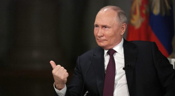 epa11138506 Russian President Vladimir Putin attends an interview with US journalist Tucker Carlson at the Kremlin in Moscow, Russia, 09 February 2024.  EPA/GAVRIIL GRIGOROV/SPUTNIK/KREMLIN POOL MANDATORY CREDIT
