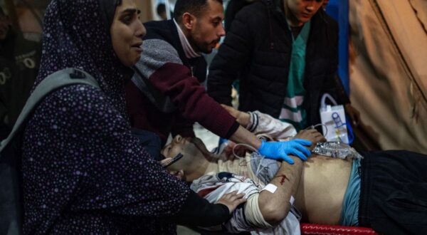 epa11146662 Wounded people are transported to Kuwait Hospital in Rafah, southern Gaza Strip, 12 February 2024, following Israeli air strikes on the Rafah refugee camp in the southern Gaza Strip. According to the Palestinian Health Ministry, 63 people have been killed and more than 230 people have been injured in the airstrikes carried out by the Israeli military. According to a statement released by the Israeli Defense Forces (IDF), two Israeli hostages were rescued during an overnight operation in Rafah. More than 28,000 Palestinians and over 1,300 Israelis have been killed, according to the Palestinian Health Ministry and the Israel Defense Forces (IDF), since Hamas militants launched an attack against Israel from the Gaza Strip on 07 October 2023, and the Israeli operations in Gaza and the West Bank which followed it.  EPA/HAITHAM IMAD ATTENTION EDITORS GRAPHIC CONTENT