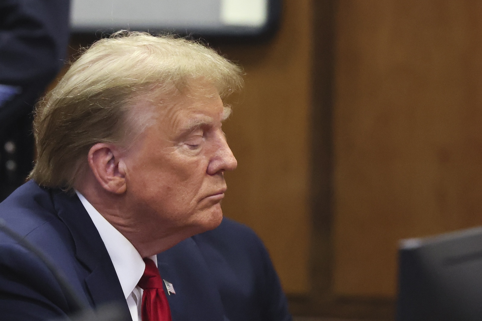 epa11155221 Former U.S. President Donald Trump appears during a court hearing on charges of falsifying business records to cover up a hush money payment to a porn star before the 2016 election, at the New York State Supreme Court in Manhattan, New York City, USA, 15 February 2024. Trump is facing 34 felony counts of falsifying business records related to payments made to adult film star Stormy Daniels during his 2016 presidential campaign.  EPA/BRENDAN MCDERMID / POOL
