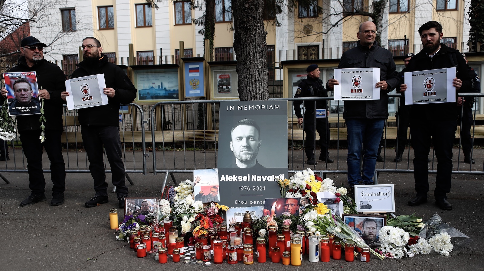 epa11163295 People pay their respects as they mourn the late Russian opposition leader Alexei Navalny following his death, outside the Russian Embassy in Bucharest, Romania, 18 February 2024. Russian opposition leader and outspoken Kremlin critic Alexei Navalny has died aged 47 in a penal colony, the Federal Penitentiary Service of the Yamalo-Nenets Autonomous District announced on 16 February 2024. A prison service statement said that Navalny 'felt unwell' after a walk on 16 February, and it was investigating the causes of his death. In late 2023, Navalny was transferred to an Arctic penal colony considered one of the harshest prisons.  EPA/ROBERT GHEMENT