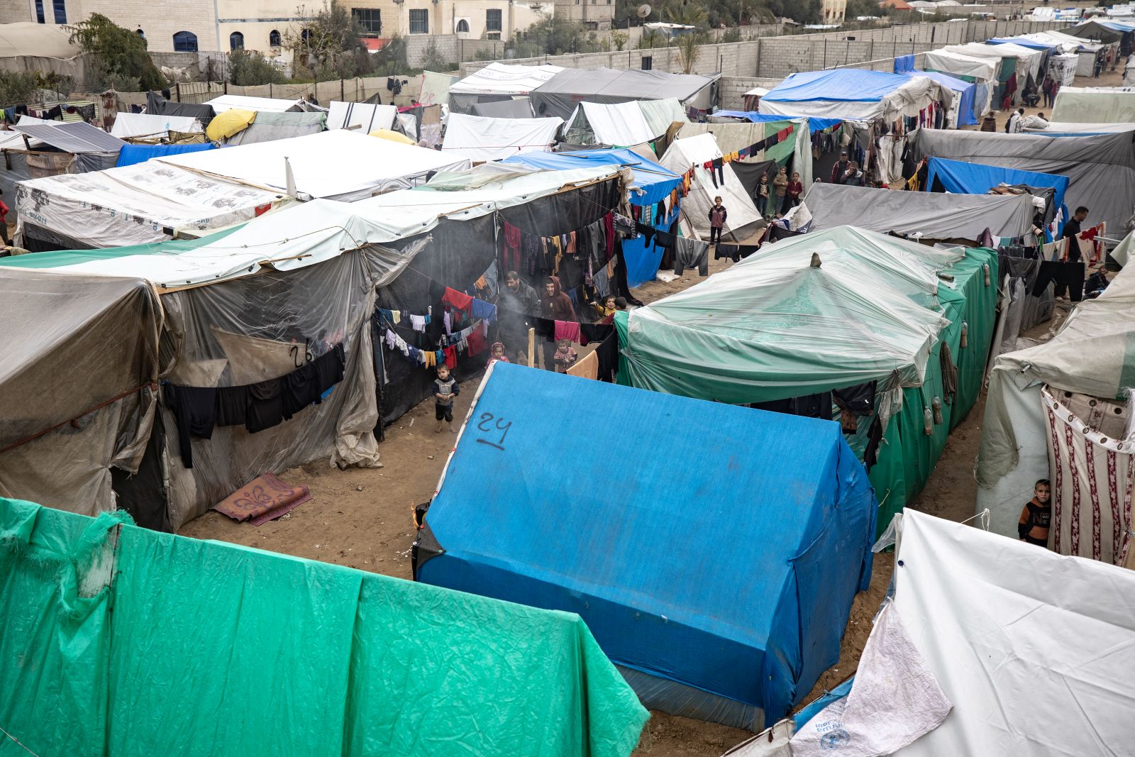 epa11163559 Temporary shelters for Internally displaced Palestinians in the Rafah camp, southern Gaza Strip, 18 February 2024. Since 07 October 2023, up to 1.9 million people, or more than 85 percent of the population, have been displaced throughout the Gaza Strip, some more than once, according to the United Nations Relief and Works Agency for Palestine Refugees in the Near East (UNRWA), which added that most civilians in Gaza are in 'desperate need of humanitarian assistance and protection'.  EPA/HAITHAM IMAD