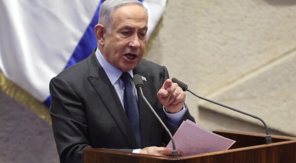 epaselect epa11166727 Israeli Prime Minister Benjamin Netanyahu speaks during the voting session for the impeachment of Hadash-Ta’al party MP Ofer Cassif in Jerusalem, 19 February 2024. The motion was brought up after Cassif publicly supported South Africa’s genocide case against Israel at the International Court of Justice (ICJ).  EPA/ABIR SULTAN