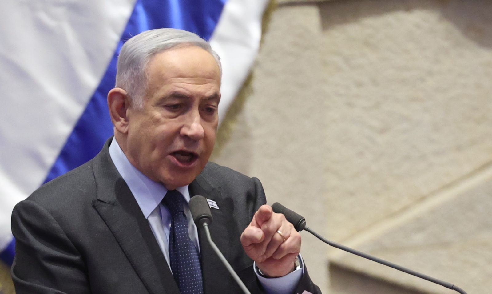 epaselect epa11166727 Israeli Prime Minister Benjamin Netanyahu speaks during the voting session for the impeachment of Hadash-Ta’al party MP Ofer Cassif in Jerusalem, 19 February 2024. The motion was brought up after Cassif publicly supported South Africa’s genocide case against Israel at the International Court of Justice (ICJ).  EPA/ABIR SULTAN