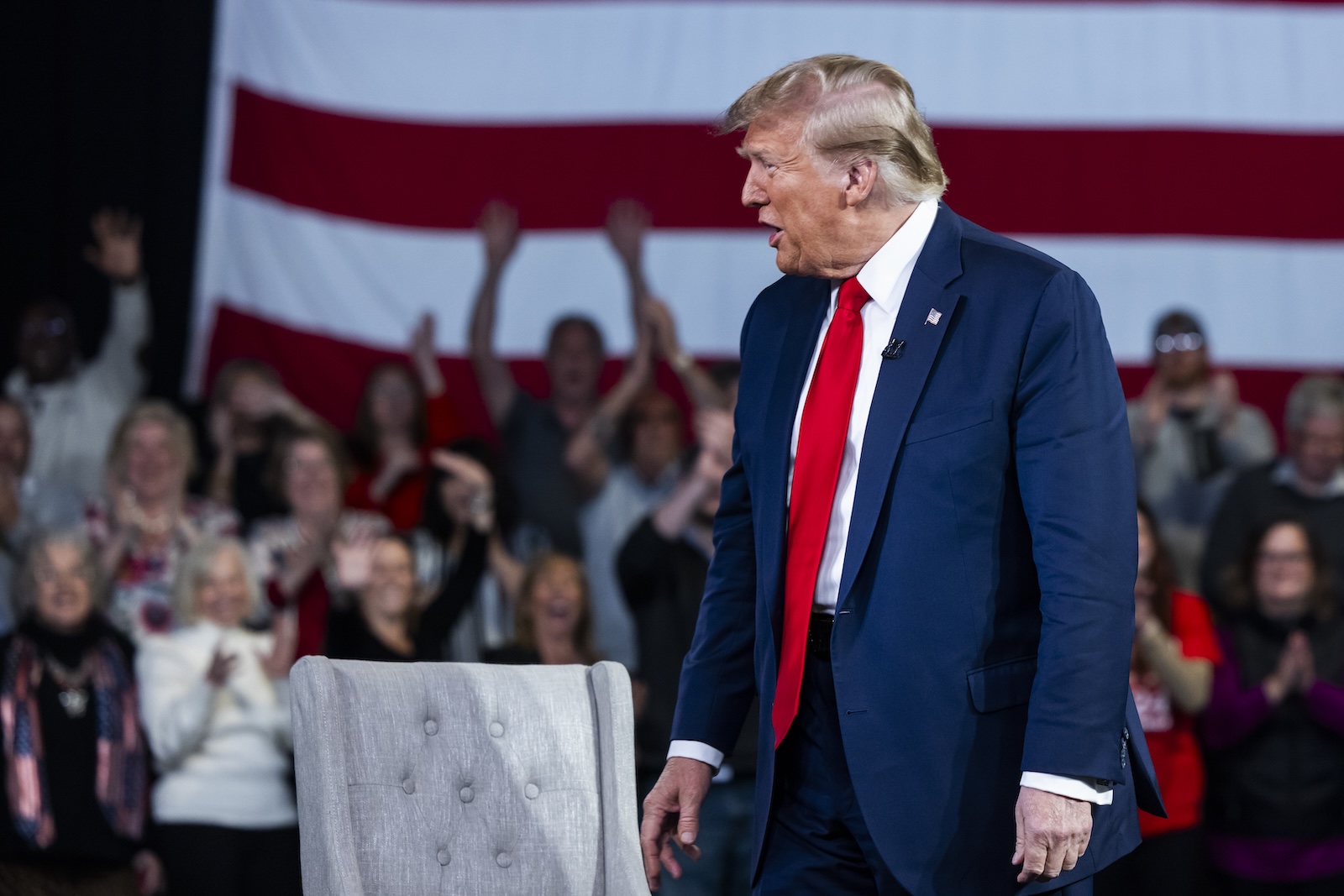 epa11168795 Former US President and current Republican presidential candidate Donald Trump prepares to speak to Fox News host Laura Ingraham during a Fox News town hall in Greenville, South Carolina, USA, 20 February 2024. Trump is running against former South Carolina governor Nikki Haley in the South Carolina Republican presidential primary, scheduled for 24 February 2024.  EPA/JIM LO SCALZO