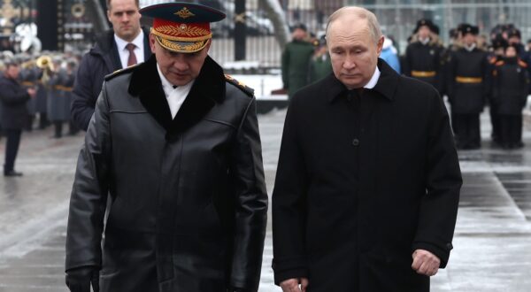 epa11175231 Russian President Vladimir Putin (R) and Defence Minister Sergei Shoigu (L) take part in a wreath laying ceremony at the Tomb of the Unknown Soldier in Alexander Garden on Defender of the Fatherland Day, in Moscow, Russia 23 February 2024. The 23 February is celebrated as the Defender of the Fatherland Day in Russia, Belarus, Kyrgyzstan, and Tajikistan marking the date in 1918 when the first mass draft into the Red Army took place in Moscow and Petrograd during the country's Civil War and war against the German Emperor.  EPA/ALEXANDER KAZAKOV/SPUTNIK/KREMLIN POOL MANDATORY CREDIT
