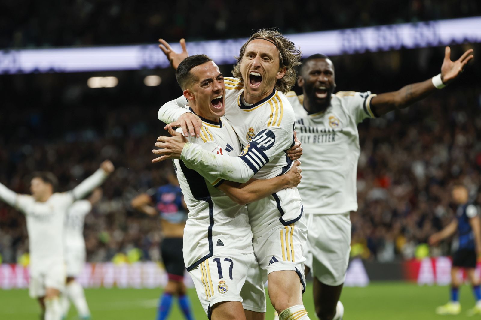 epa11181548 Real Madrid's Luka Modric (C) celebrates after scoring the 1-0 goal during the Spanish LaLiga soccer match between Real Madrid and Sevilla FC in Madrid, Spain, 25 February 2024.  EPA/Javier Lizon