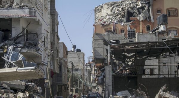 epa11186901 Destroyed houses in Al Nuseirat refugee camp, central Gaza Strip, 28 February 2024, following Israeli air strikes. More than 29,900 Palestinians and over 1,300 Israelis have been killed, according to the Palestinian Health Ministry and the Israel Defense Forces (IDF), since Hamas militants launched an attack against Israel from the Gaza Strip on 07 October 2023, and the Israeli operations in Gaza and the West Bank which followed it.  EPA/MOHAMMED SABER