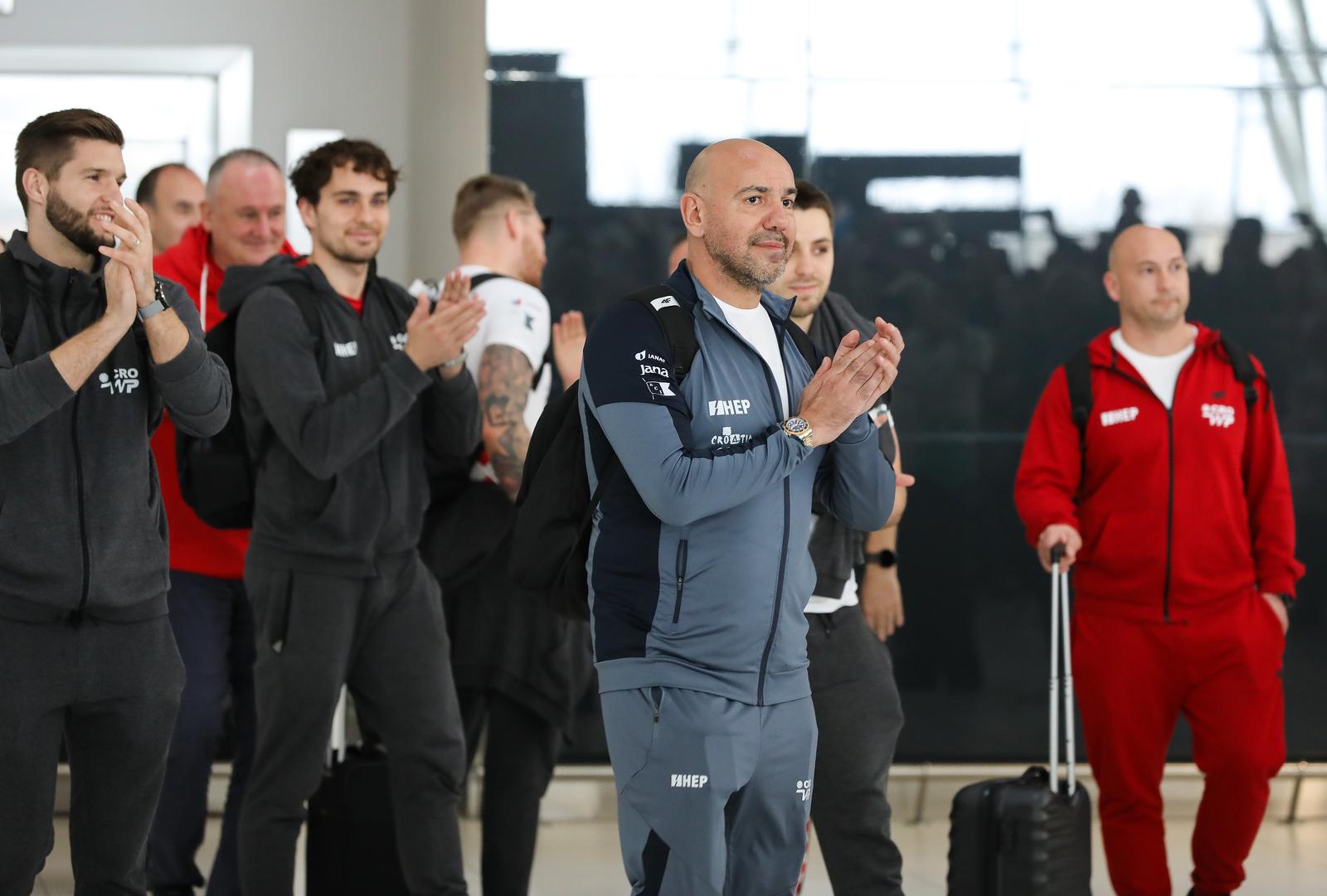 18.02.2024., Zagreb -  Hrvatska vaterpolska reprezentacija  nakon osvojenog zlata vratila se iz Katra sa Svjetskog prvenstva  Photo: Jurica Galoic/PIXSELL