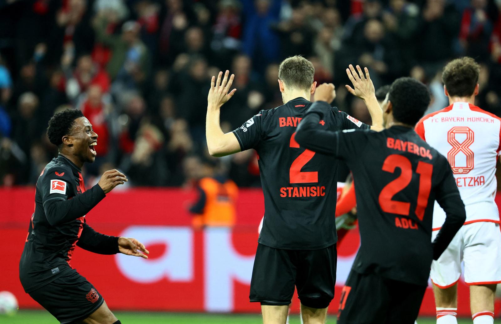 Soccer Football - Bundesliga - Bayer Leverkusen v Bayern Munich - BayArena, Leverkusen, Germany - February 10, 2024 Bayer Leverkusen's Josip Stanisic celebrates scoring their first goal with teammates REUTERS/Wolfgang Rattay DFL REGULATIONS PROHIBIT ANY USE OF PHOTOGRAPHS AS IMAGE SEQUENCES AND/OR QUASI-VIDEO. Photo: Wolfgang Rattay/REUTERS