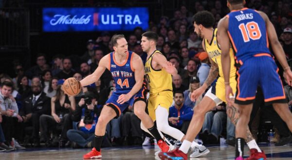 Feb 10, 2024; New York, New York, USA; New York Knicks forward Bojan Bogdanovic (44) posts up against Indiana Pacers forward Doug McDermott (20) during the second quarter at Madison Square Garden. Mandatory Credit: John Jones-USA TODAY Sports Photo: John Jones/REUTERS