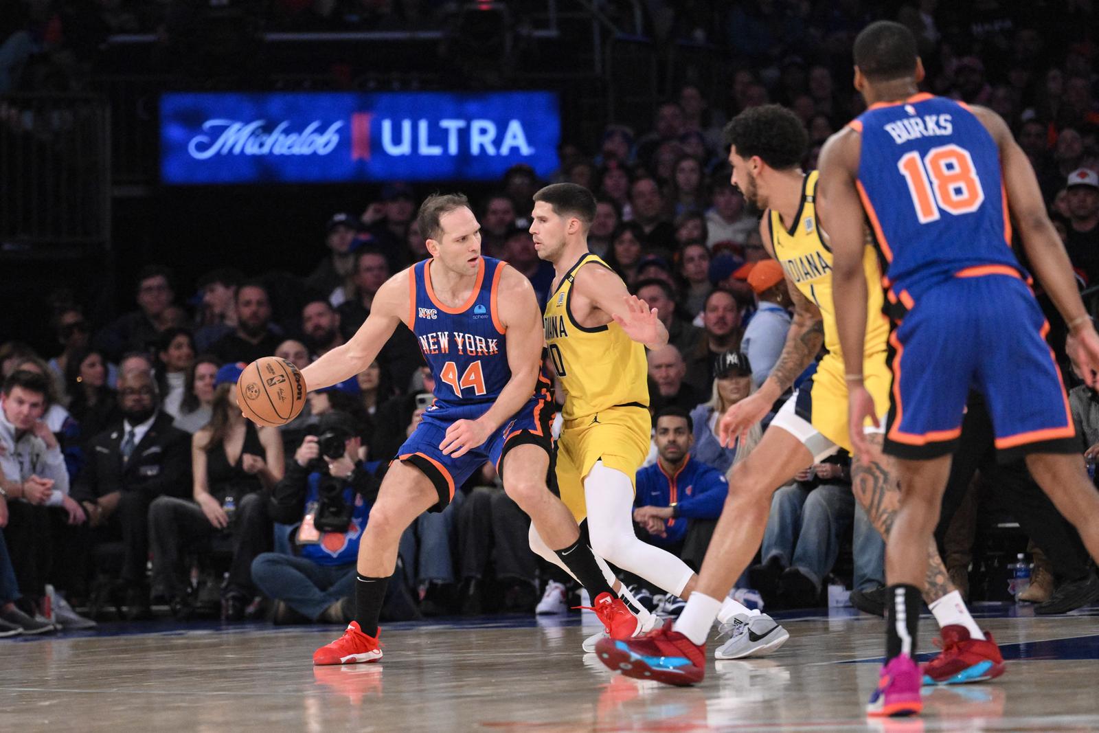 Feb 10, 2024; New York, New York, USA; New York Knicks forward Bojan Bogdanovic (44) posts up against Indiana Pacers forward Doug McDermott (20) during the second quarter at Madison Square Garden. Mandatory Credit: John Jones-USA TODAY Sports Photo: John Jones/REUTERS