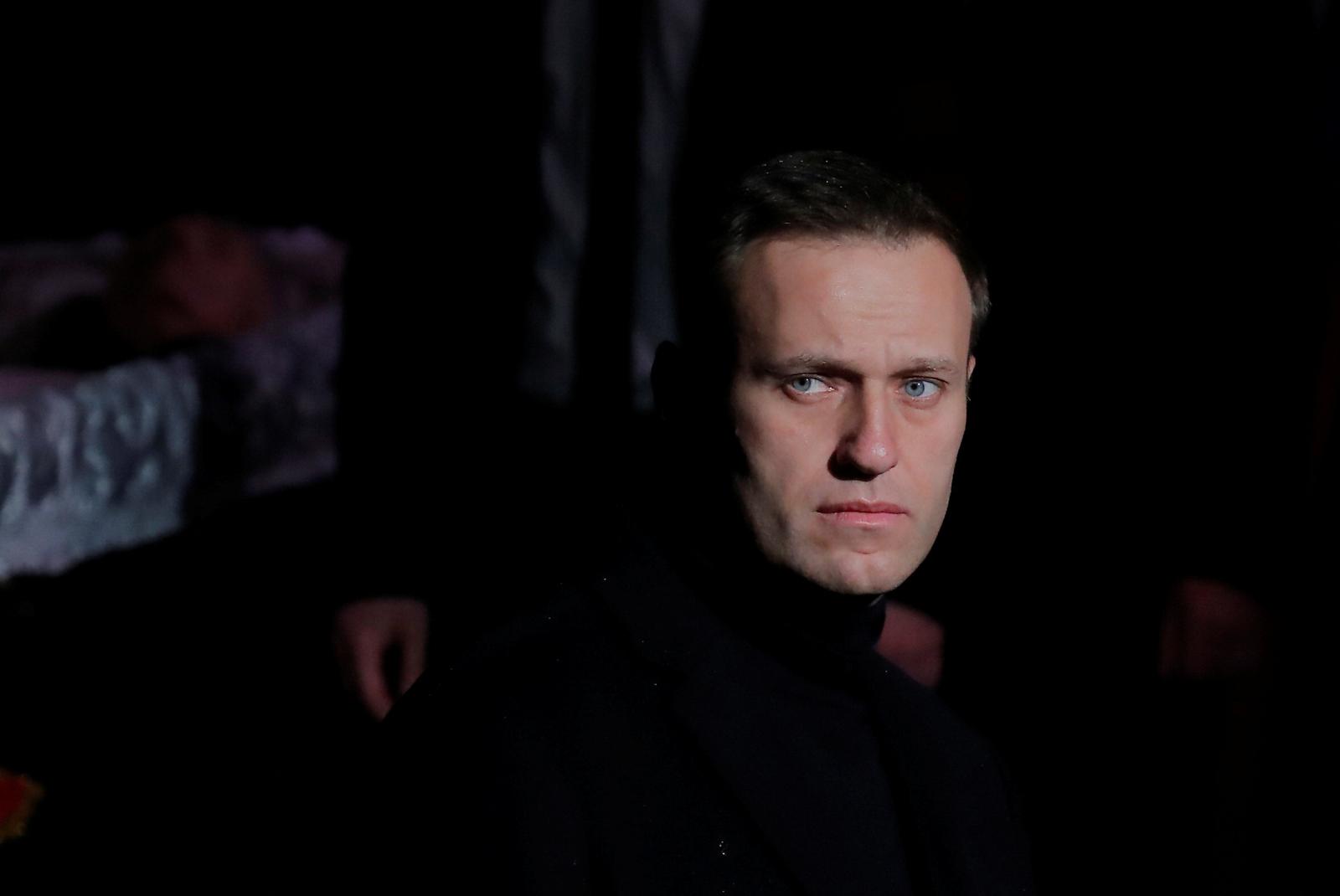 FILE PHOTO: Russian opposition leader Alexei Navalny pays respect to founder of Russia's oldest human rights group and Sakharov Prize winner Lyudmila Alexeyeva in Moscow, Russia December 11, 2018. REUTERS/Maxim Shemetov/File Photo Photo: MAXIM SHEMETOV/REUTERS