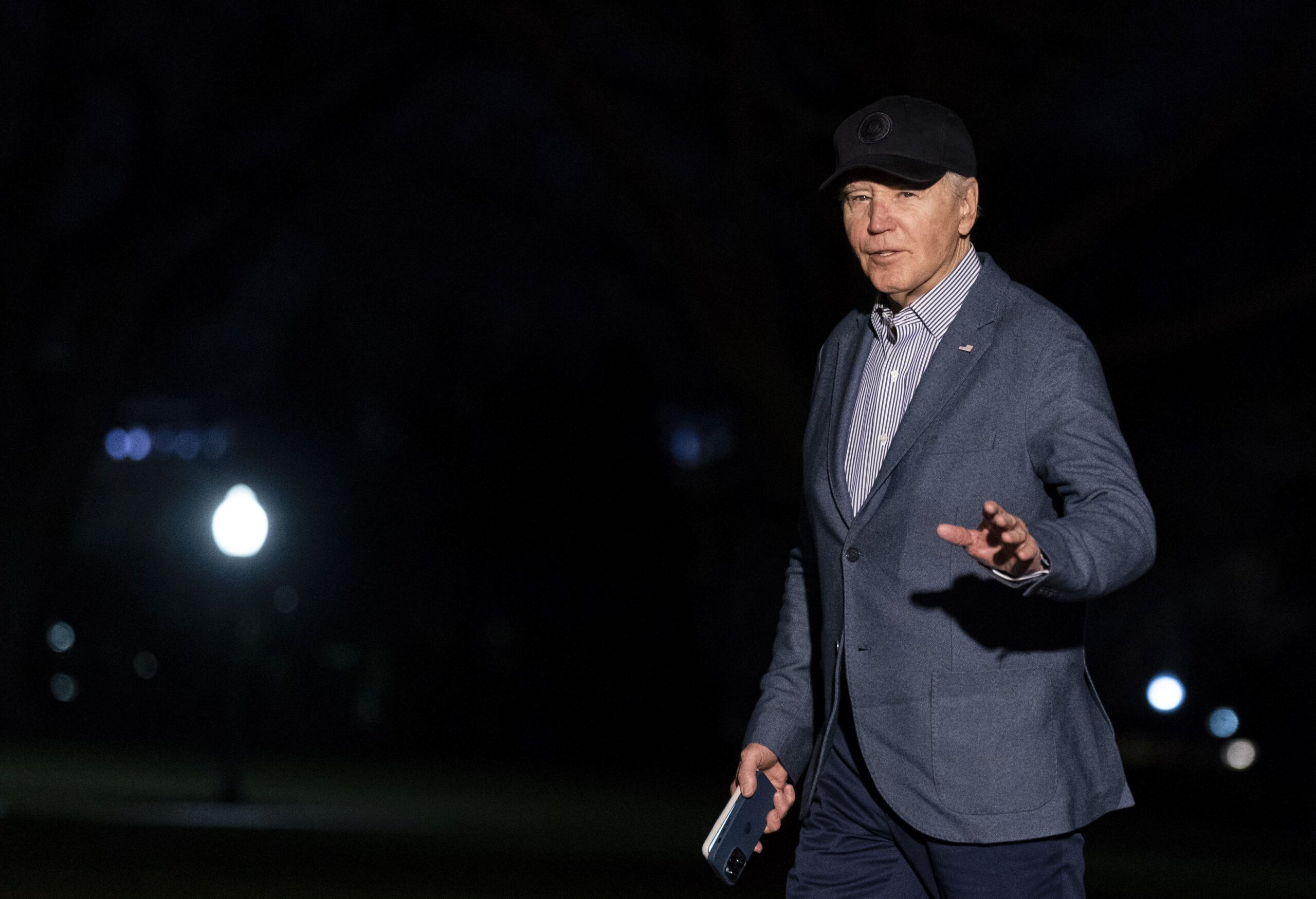 epa11130095 US President Joe Biden walks on the South Lawn of the White House after arriving on Marine One in Washington, DC, USA, 05 February 5, 2024. The Biden administration on Sunday vowed more strikes against Iran’s forces and its proxies in the Middle East after three straight days of punishing attacks, even as senior officials insisted the US won’t be pulled into a prolonged regional conflict.  EPA/Al Drago / POOL