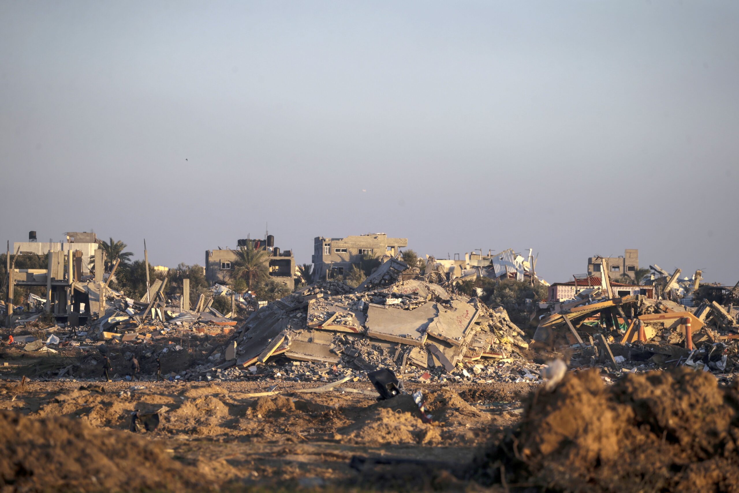 epa11134679 Destroyed houses in Al Bureij refugee camp, Gaza Strip, 07 February 2024, following Israeli air strikes. More than 27,500 Palestinians and over 1,300 Israelis have been killed, according to the Palestinian Health Ministry and the Israel Defense Forces (IDF), since Hamas militants launched an attack against Israel from the Gaza Strip on 07 October 2023, and the Israeli operations in Gaza and the West Bank which followed it.  EPA/MOHAMMED SABER