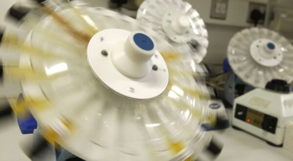 Samples of urine is being prepared for doping tests during a media open day, ahead of the Vancouver Winter Olympics, at the King's College London Drug Control Centre, London, Friday Feb. 5, 2010. The drug control centre is the UK's only World Anti-Doping Agency (WADA) accredited laboratory to carry out doping tests on sports competitors. (AP Photo/Sang Tan)