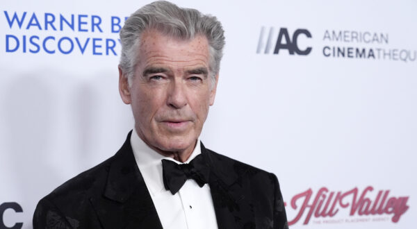 Pierce Brosnan poses at the 37th Annual American Cinematheque Awards at the Beverly Hilton, Thursday, Feb. 15, 2024, in Beverly Hills, Calif. (AP Photo/Chris Pizzello)