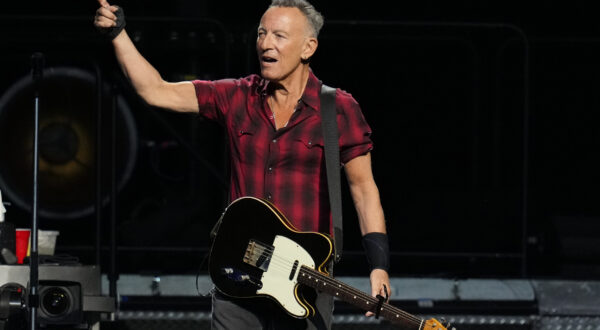 Bruce Springsteen shouts to the crowd on stage during his concert of Bruce Springsteen and The E Street Band World Tour 2024 performance Tuesday, March 19, 2024, in Phoenix. (AP Photo/Ross D. Franklin)