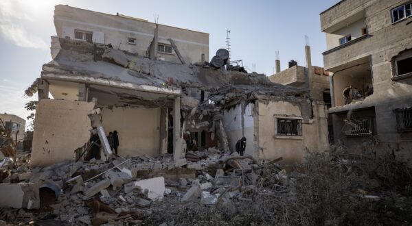 epa11169230 Palestinians inspect the rubble of a house after an Israeli air strike on the Rafah refugee camp, southern Gaza Strip, 21 February 2024. More than 29,100 Palestinians and over 1,300 Israelis have been killed, according to the Palestinian Health Ministry and the Israel Defense Forces (IDF), since Hamas militants launched an attack against Israel from the Gaza Strip on 07 October 2023, and the Israeli operations in Gaza and the West Bank which followed it.  EPA/HAITHAM IMAD
