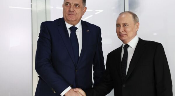 epa11170200 Russian President Vladimir Putin (R) and President of Republika Srpska (Serb Republic) Milorad Dodik shake hands as they attend a meeting at the Kazan Expo international exhibition centre in Kazan, Republic of Tatarstan, Russia, 21 February 2024. Vladimir Putin and Milorad Dodik arrived to Kazan attend opening ceremony of the Games of the Future. The phygital concept competition, the Games of the Future Kazan 2024, will be held in 21 innovative disciplines, each of which combines classic sports and e-sports, from 21 February to 03 March 2024.  EPA/SERGEI BOBYLEV/SPUTNIK/KREMLIN POOL / POOL MANDATORY CREDIT