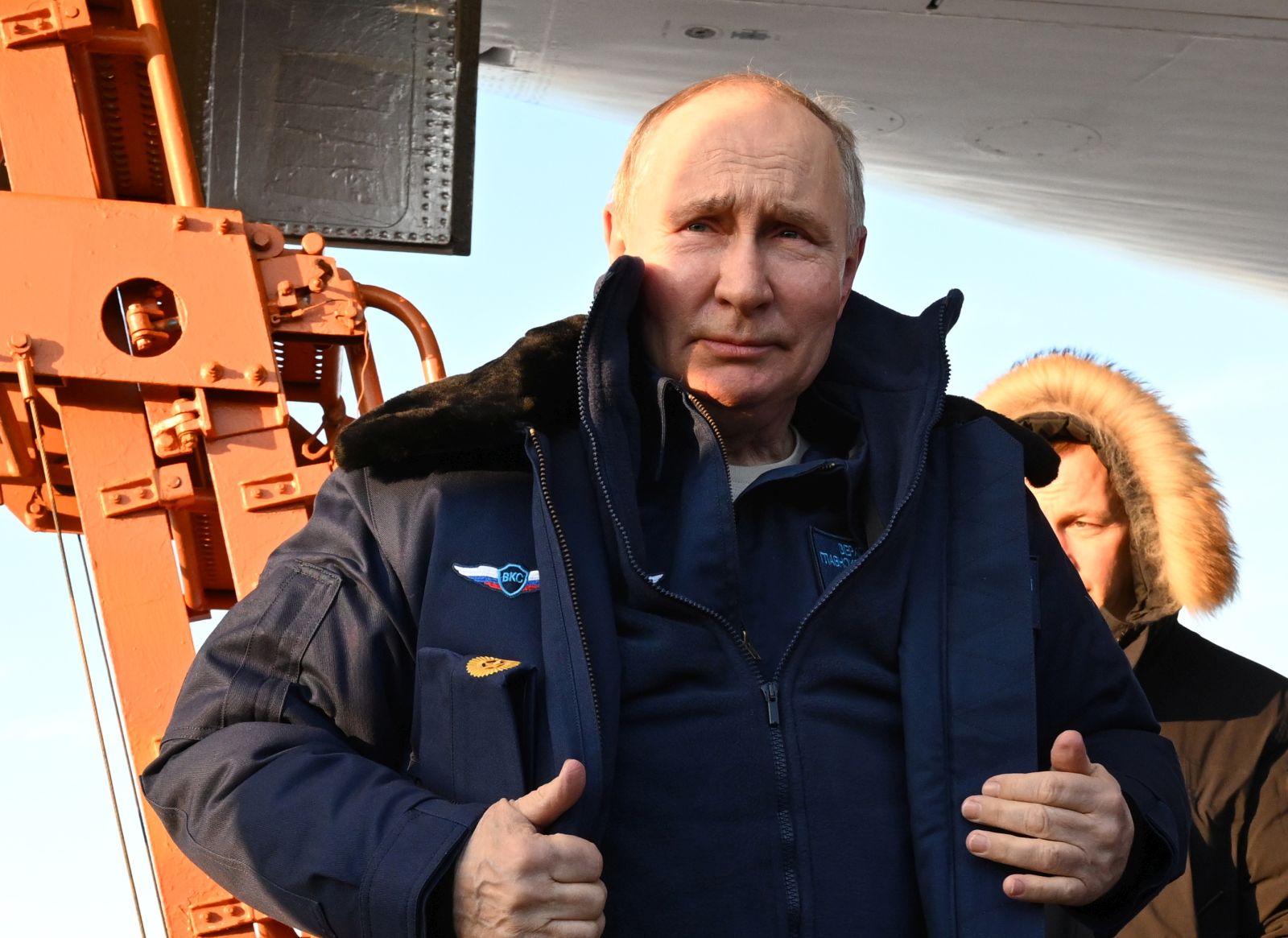 epa11172552 Russian President Vladimir Putin answers questions from journalists after a test flight aboard a Tupolev Tu-160 M strategic missile carrier during a visit to the Kazan Aviation Factory named after Sergei Gorbunov, a branch of the Tupolev military industry company, in Kazan, Republic of Tatarstan, Russia, 22 February 2024. Tu-160 (according to NATO codification - Blackjack) is a supersonic strategic missile carrier-bomber with variable sweep wings, developed at the Tupolev Design Bureau in the 1970-1980s. Although serial production of the Tu-160 was discontinued in the 1990s, works are underway in Russia to resume construction of the aircraft in a new look - Tu-160M.  EPA/DMITRIY AZAROV/SPUTNIK/KREMLIN POOL MANDATORY CREDIT