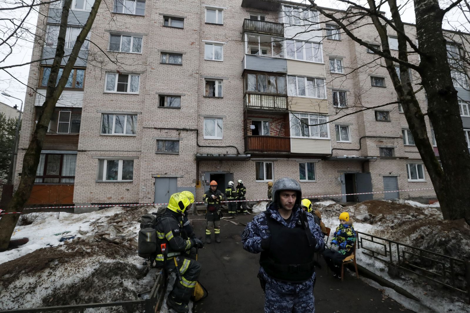 epaselect epa11192773 Russian emergency servicemen and investigators work near a damaged multi-storey residential building following an alleged drone attack in Saint Petersburg, Russia, 02 March 2024. Governor of Saint Petersburg, Alexander Beglov, wrote on his telegram channel that 'The emergency occurred in the Krasnogvardeisky district of St. Petersburg. As a result of the incident, residents of the affected apartments were evacuated'.  EPA/ANATOLY MALTSEV