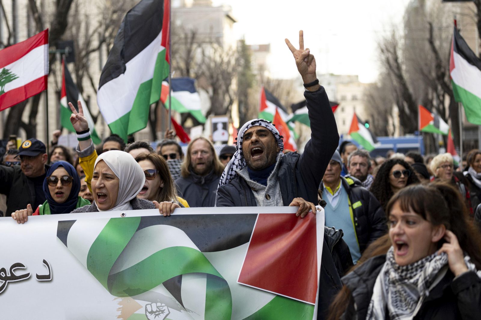epa11194488 Participants hold Palestinia flags as they march during a pro-Palestinian rally in Rome, Italy, 02 March 2024. Thousands of Israelis and Palestinians have been killed since the militant group Hamas launched an unprecedented attack on Israel from the Gaza Strip on 07 October 2023, and the Israeli strikes on the Palestinian enclave which followed it.  EPA/MASSIMO PERCOSSI