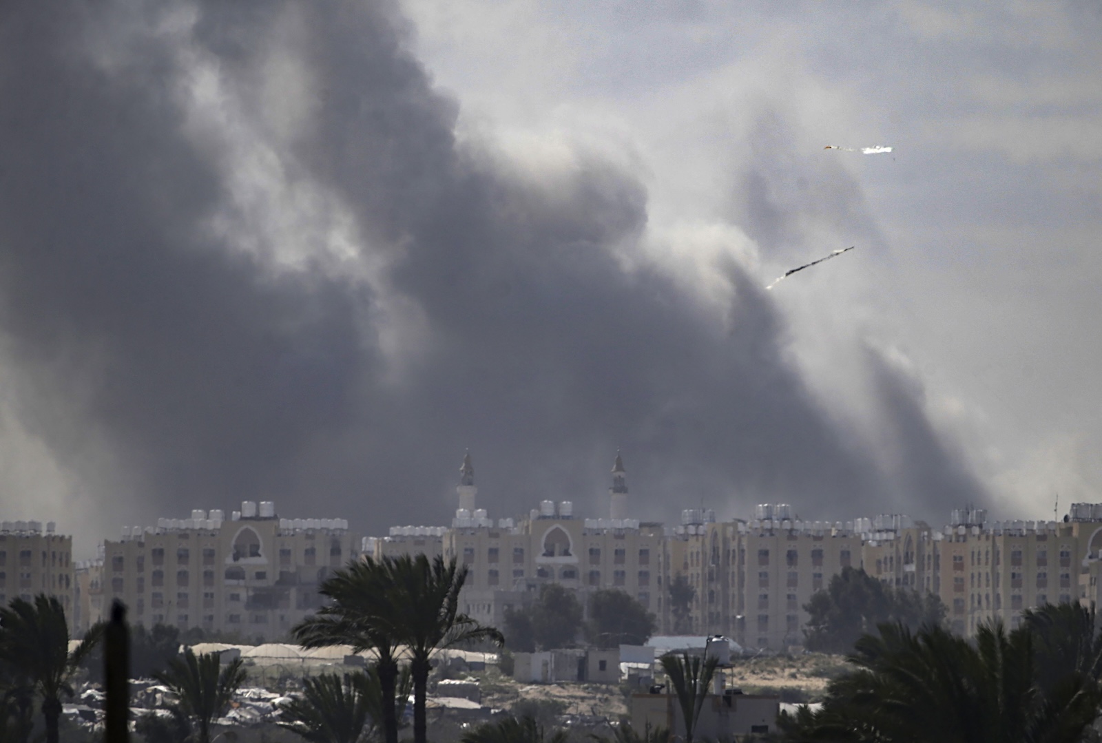 epa11198213 Smoke rises following an Israeli air strike during a military operation in Khan Yunis, southern Gaza Strip, 04 March 2024. More than 30,500 Palestinians and over 1,300 Israelis have been killed, according to the Palestinian Health Ministry and the Israel Defense Forces (IDF), since Hamas militants launched an attack against Israel from the Gaza Strip on 07 October 2023, and the Israeli operations in Gaza and the West Bank which followed it. The Israeli military stated on 04 March that in recent days its forces launched an operation aimed at 'circling the west' in Khan Yunis, carrying out a series of strikes on dozens of targets from the 'air and the ground'.  EPA/MOHAMMED SABER