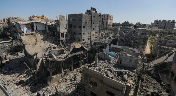 epa11199885 Palestinians search for missing people under the rubble of a destroyed house following Israeli airstrikes in the west of Al Nusairat refugee camp, Gaza Strip, 05 March 2024. More than 30,500 Palestinians and over 1,300 Israelis have been killed, according to the Palestinian Health Ministry and the Israel Defense Forces (IDF), since Hamas militants launched an attack against Israel from the Gaza Strip on 07 October 2023, and the Israeli operations in Gaza and the West Bank which followed it.  EPA/MOHAMMED SABER