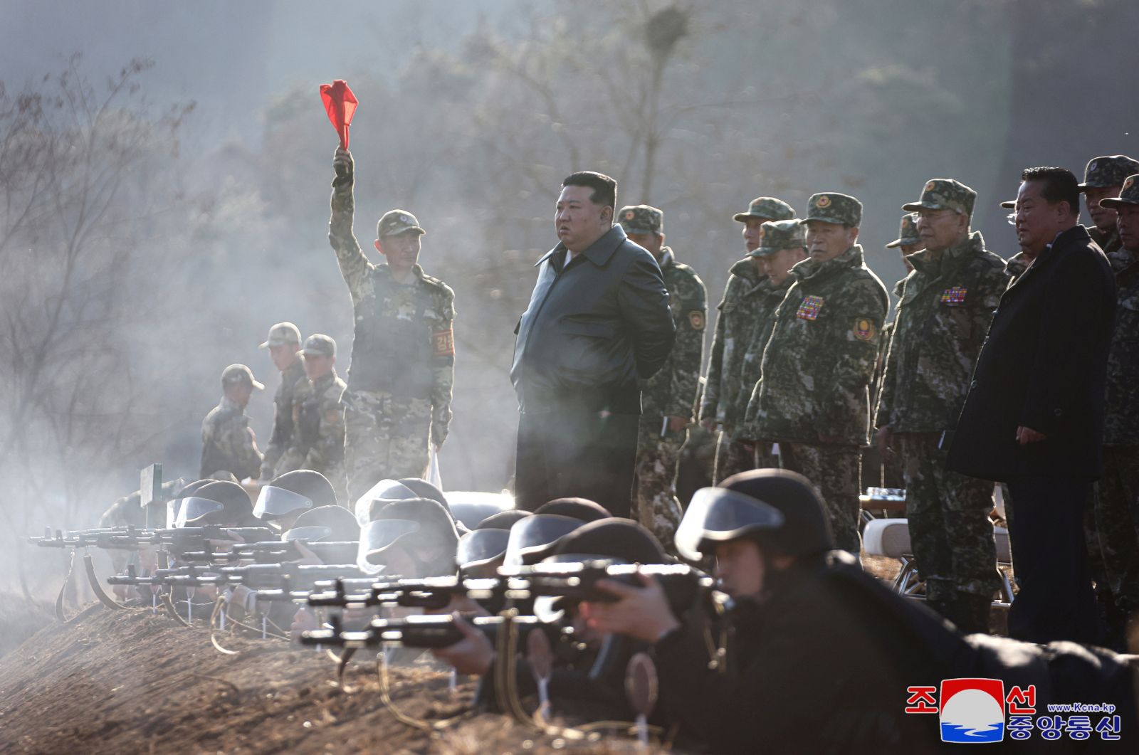 epa11203158 A photo released by the official North Korean Central News Agency (KCNA) shows North Korean leader Kim Jong Un (C) visiting a major operational training base in the western area of the Korean People's Army (KPA) at an unknown location in North Korea, 06 March 2024 (issued 07 March 2024). According to KCNA, North Korean leader Kim Jong Un stressed the need to strengthen the combat capability of the KPA and intensifying practical actual-war drills to ensure victory in a war during the visit.  EPA/KCNA   EDITORIAL USE ONLY  EDITORIAL USE ONLY
