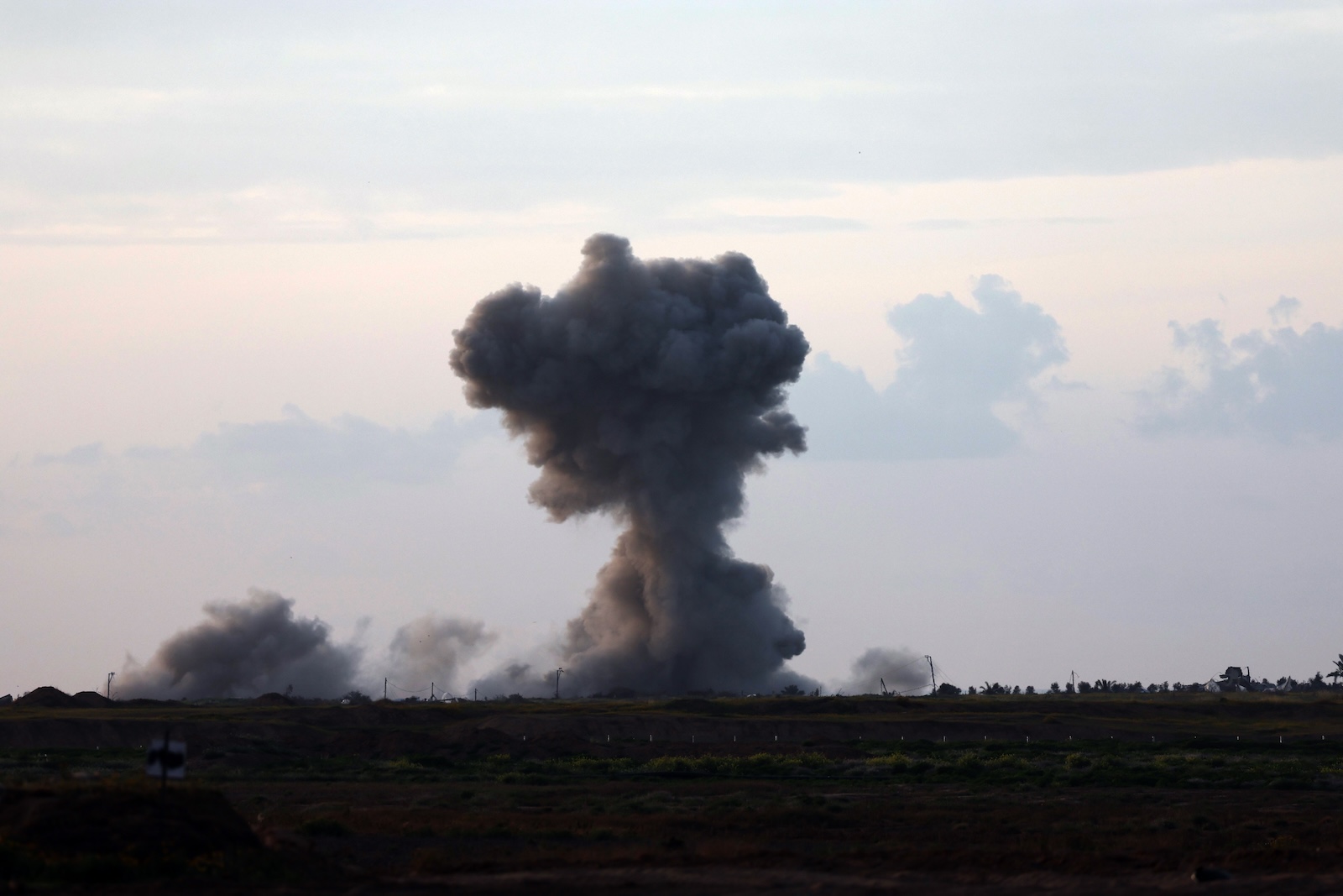 epa11204638 Smoke rises form the area of Khan Younis as a result of Israeli airstrike in the southern part of the Gaza Strip, as seen from the Israeli side of the border, 07 March 2024. More than 30,000 Palestinians and over 1,300 Israelis have been killed, according to the Palestinian Health Ministry and the Israel Defense Forces (IDF), since Hamas militants launched an attack against Israel from the Gaza Strip on 07 October 2023, and the Israeli operations in Gaza and the West Bank which followed it.  EPA/ATEF SAFADI