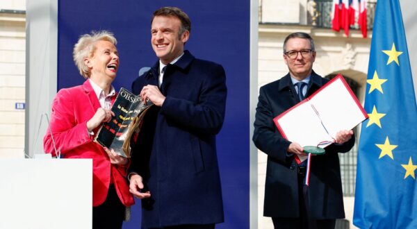 epa11206228 French President Emmanuel Macron and writer Claudine Monteil attend a ceremony to seal the right to abortion in the French constitution, on International Women's Day, at the Place Vendome, in Paris, France, 08 March 2024. French lawmakers on 04 March approved a bill to enshrine abortion rights in the Constitution becoming the only country in the world to clearly protect the right to terminate a pregnancy in its basic law.  EPA/Gonzalo Fuentes / POOL  MAXPPP OUT
