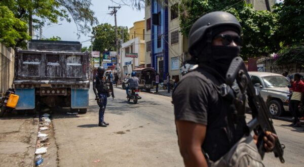 epa11232539 Police patrol the streets of Port-au-Prince, Haiti, on 20 March 2024. At least seven bodies appeared this 20 March in the streets of Petion-ville, in the hills of Haiti's capital, two days after at least fifteen other people were found dead in the same area. The bodies appeared, some shot and others charred, while the services in charge collected the bodies and placed them in coffins, as EFE was able to verify. Haiti's Prime Minister, Ariel Henry, resigned on 11 March 2024 after weeks of crisis and gang violence in the country.  EPA/Mentor David Lorens