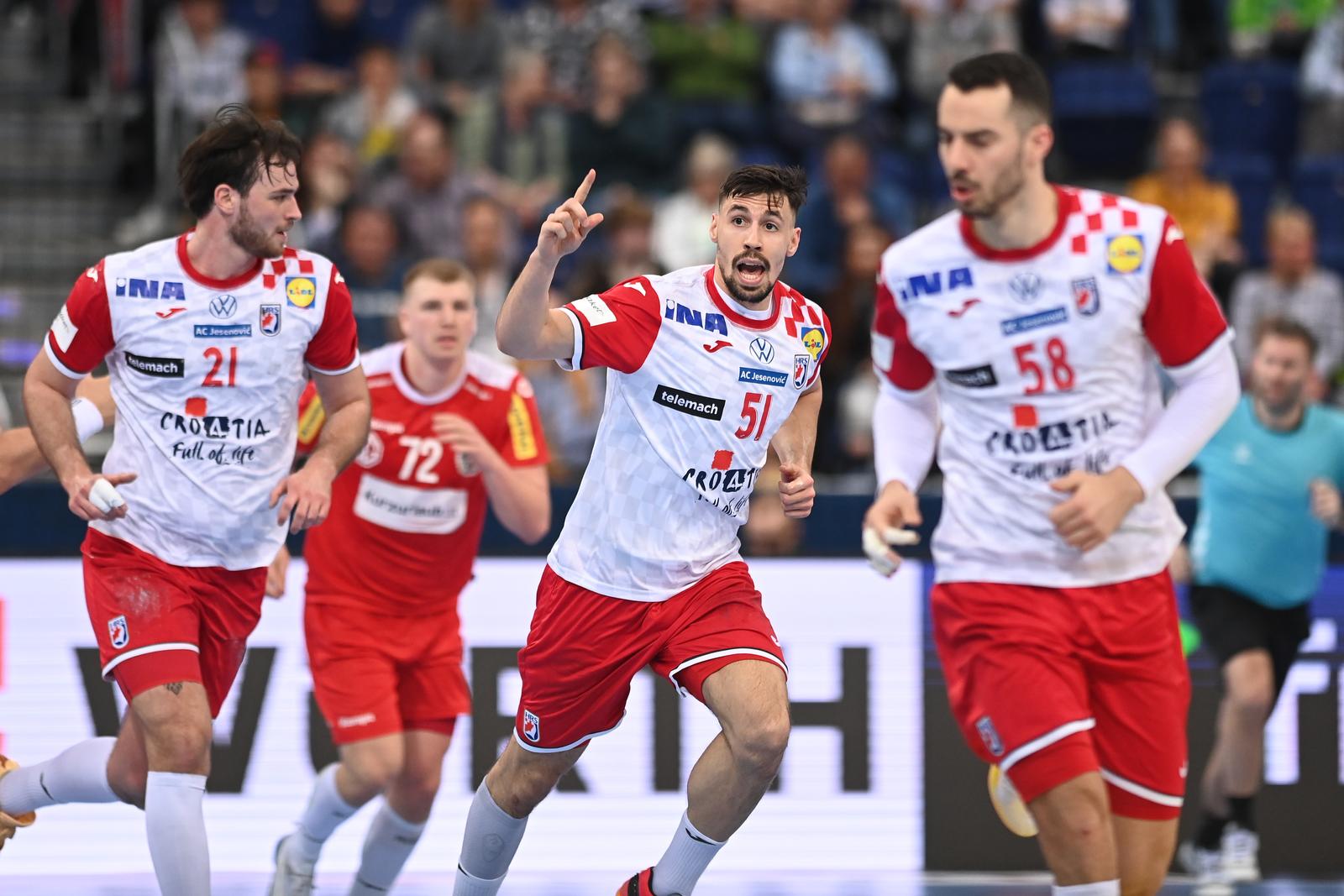 RIGHTS ONLY FOR: Croatia, Slovenia, Bosnia, Serbia, Montenegro   14 March 2024, Lower Saxony, Hanover: Handball: Olympic Qualification Men, Croatia - Austria, Qualification, Tournament 2, Matchday 1, ZAG-Arena. Croatia's Ivan Martinovic (M) gesticulates. Photo: Swen Pförtner/dpa Photo: Swen Pförtner/PIXSELL