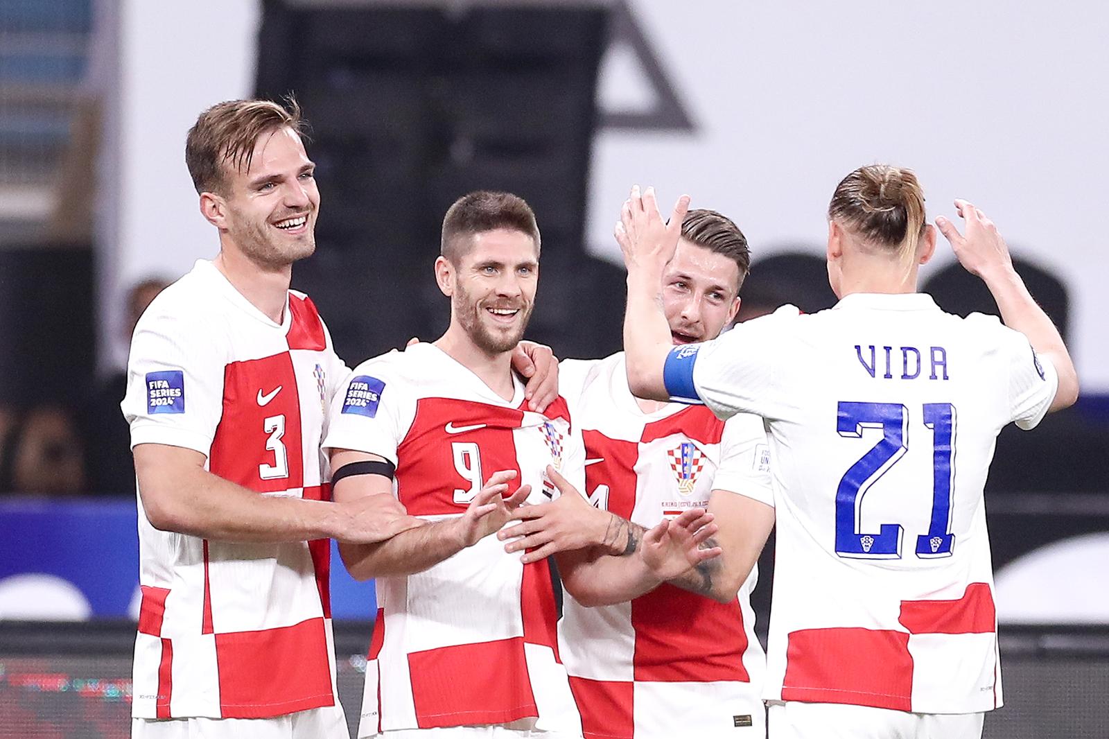 26.03.2024., stadion New Administrative Capital, Kairo, Egipat - Finale prijateljskog turnira ACUD Cupa, Egipat - Hrvatska. Slavlje nogometasa Hrvatske nakon pogotka Andreja Kramarica za vodstvo 3:1. Marin Pongracic, Andrej Kramaric, Marco Pasalic, Domagoj Vida Photo: Matija Habljak/PIXSELL