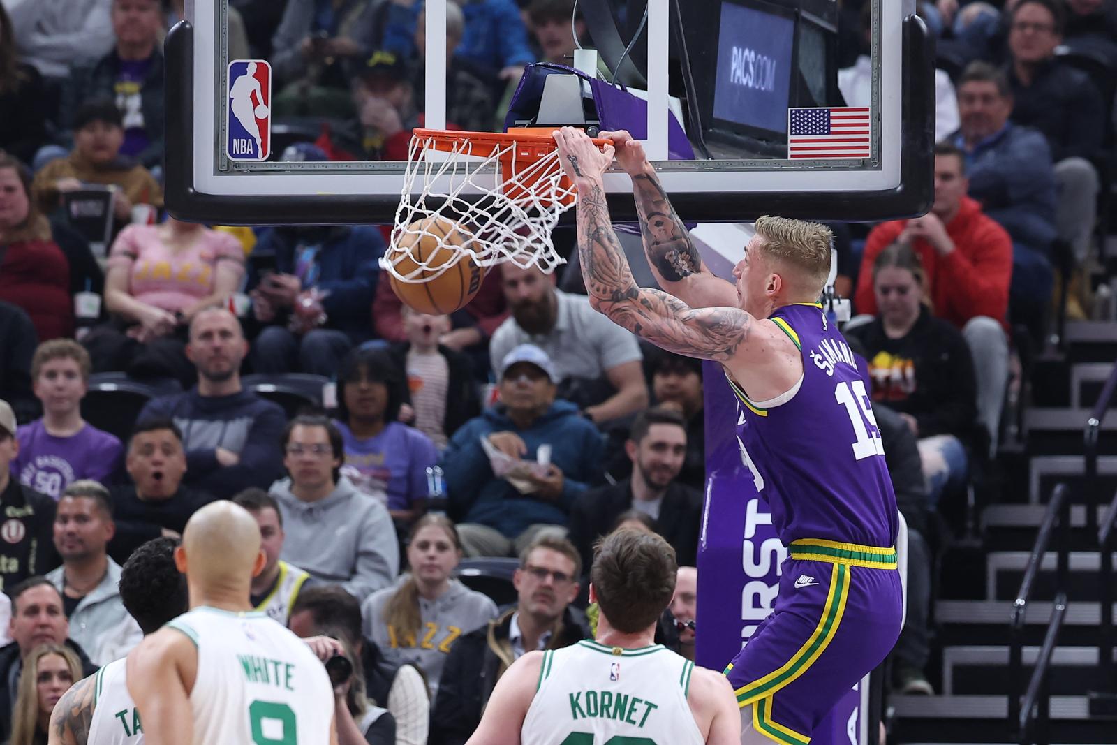 Mar 12, 2024; Salt Lake City, Utah, USA; Utah Jazz forward Luka Samanic (19) dunks the ball against the Boston Celtics during the first quarter at Delta Center. Mandatory Credit: Rob Gray-USA TODAY Sports Photo: Rob Gray/REUTERS
