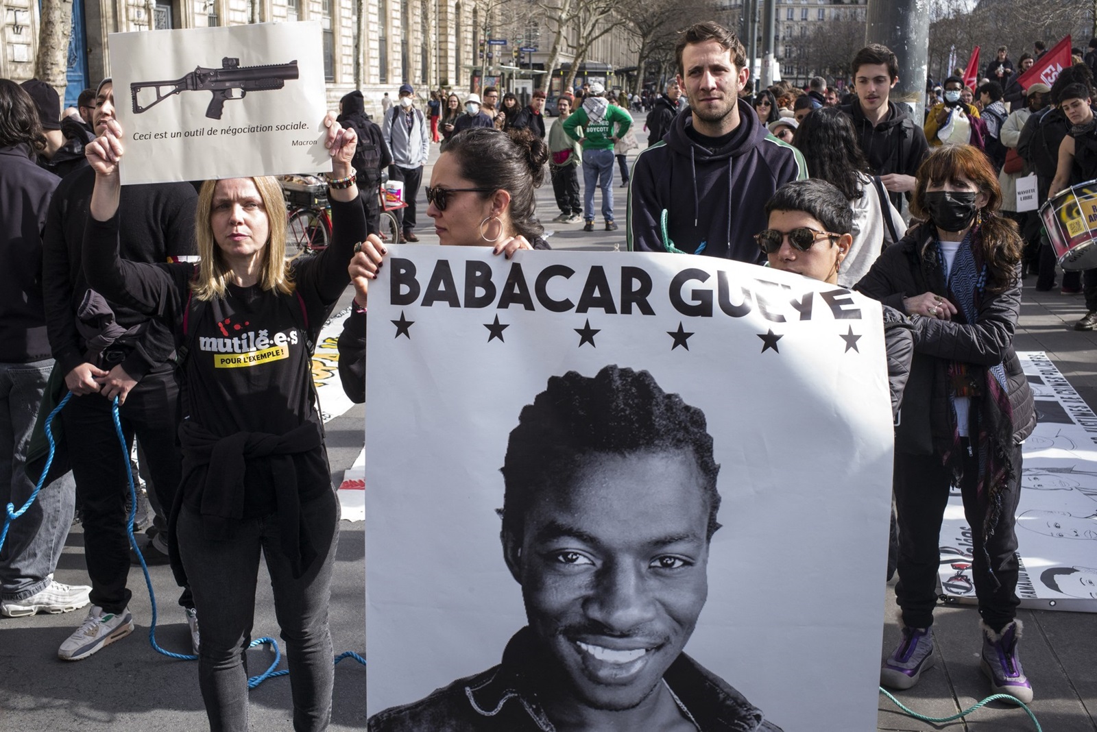 Paris, 2024-03-16. Demonstrator holding a sign reading « This is a negotiating tool ». The Reseau d Entraide Verite et Justice (REVJ) is organising a march against state violence and systemic racism on 16 March 2024 as part of the International Day Against Police Brutality. Photograph by Eric Broncard/Hans Lucas.
France, Paris, 2024-03-16. Manifestante tenant une pancarte «Ceci est un outil de negociation». Le Reseau d’Entraide Verite et Justice (REVJ) organise le 16 mars 2024 la marche contre les violences d’Etat et le racisme systemique dans le cadre de la Journee Internationale contre la brutalite policiere. Photographie par Eric Broncard/Hans Lucas.,Image: 857400074, License: Rights-managed, Restrictions: , Model Release: no, Credit line: Eric Broncard / AFP / Profimedia