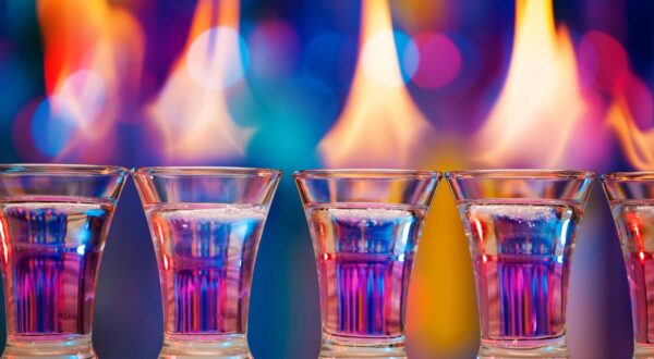 Close-up picture of hot shot glasses standing in a row on a bar counter,Image: 318252558, License: Royalty-free, Restrictions: , Model Release: no, Credit line: Sergey Novikov / Alamy / Alamy / Profimedia